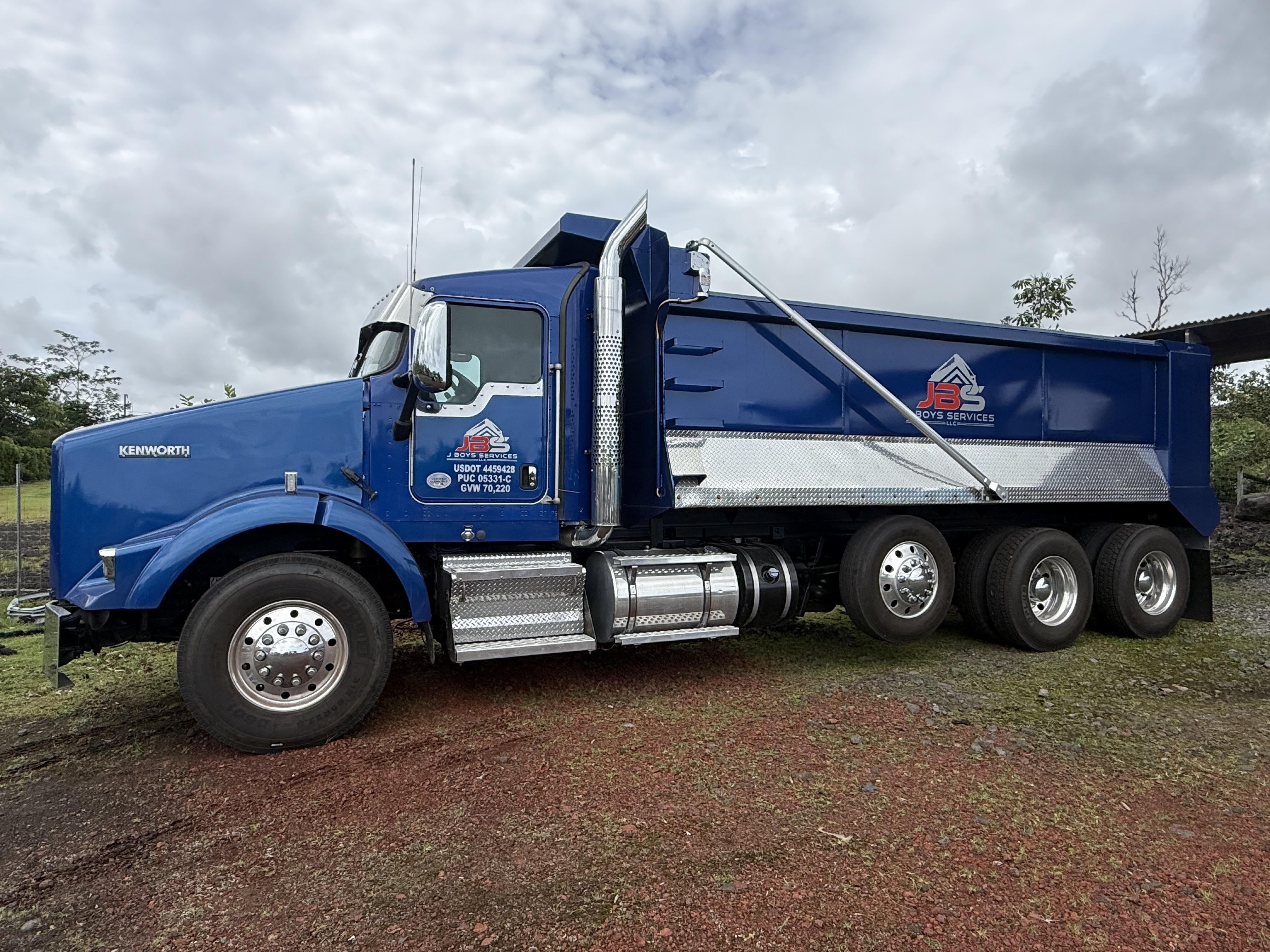J Boys Services blue Kenworth dump truck on the Big Island